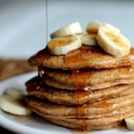 stack of pancakes with banana slices