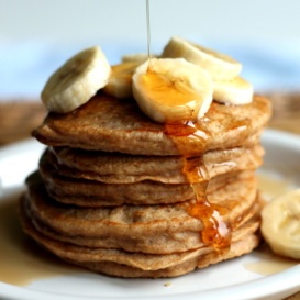 Fluffy whole wheat banana quinoa pancakes packed with protein from quinoa and greek yogurt. The perfect healthy breakfast that's freezer friendly and delicious with your favorite toppings.