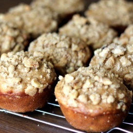 Fluffy, better-for-you banana muffins with a perfectly sweet brown sugar walnut crumble. These healthy banana muffins are lower in fat & sugar for a delicious muffin that's perfect for breakfasts or snacks.