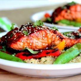 sesame ginger sweet teriyaki salmon served with a veggie-packed garlic quinoa stir-fry. This bright, flavorful dish is perfect for meal prep and weeknight dinners.