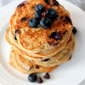 Deliciously fluffy blueberry chocolate chip quinoa pancakes packed with protein from egg whites, greek yogurt, and quinoa.