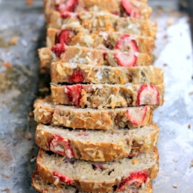 sliced banana bread with coconut and strawberries