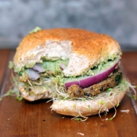 black bean burger on bun with sprouts