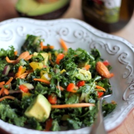 Kale rainbow detox salad in a bowl