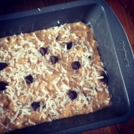 Healthy chocolate chip coconut oatmeal banana bread in a loaf pan