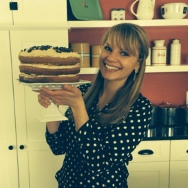 Monique holding banana chocolate chip cake