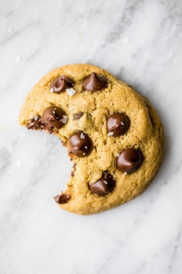 gluten free chocolate chip cookie with a bite taken out