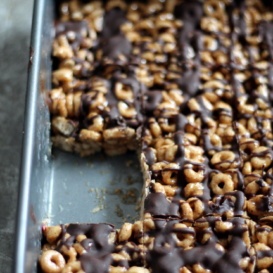 cheerio bars with chocolate in a baking tray