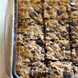 Coconut oatmeal bars in a glass baking pan