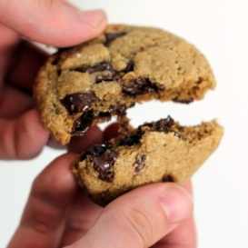 Breaking a gluten free oatmeal cookie in half