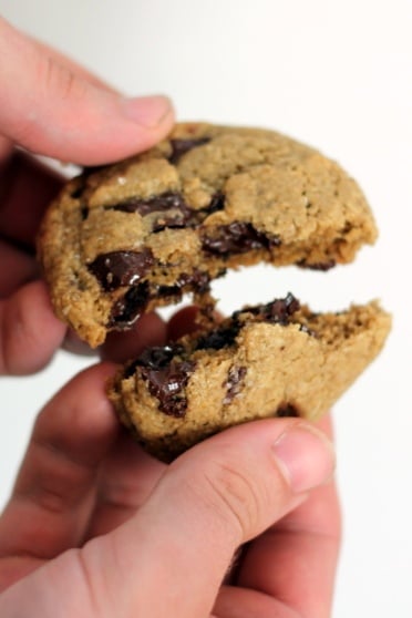 Breaking a gluten free oatmeal cookie in half