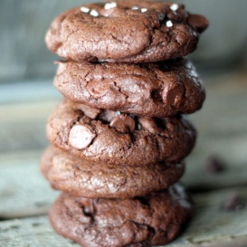 Chewy double chocolate chip cookies in a stack