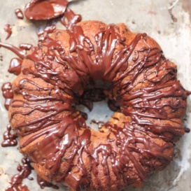 A lightened up banana bundt cake made with whole wheat flour, a touch of brown butter, honey and dark chocolate.