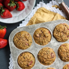 Chia, Lemon & Strawberry Zucchini Muffins in a muffin tin