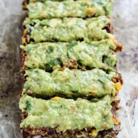 meatless black bean loaf topped with avocado sauce