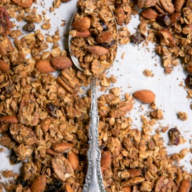 coconut oil granola on pan with spoon