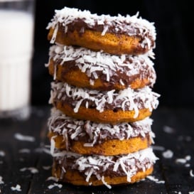 Sweet Potato Donuts with Dark Chocolate and Coconut in a stack