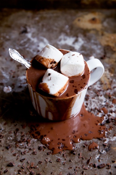 mug of coconut milk hot chocolate with whipped cream