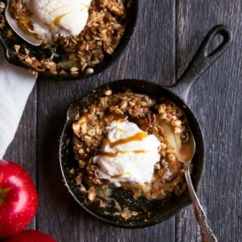 caramel apple crisps in iron skillets
