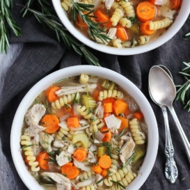 slow cooker chicken noodle soup in two bowls