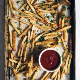 Healthy Baked Crispy French Fries with garlic, parmesan and truffle oil! Taste like your favorite from a restaurant!