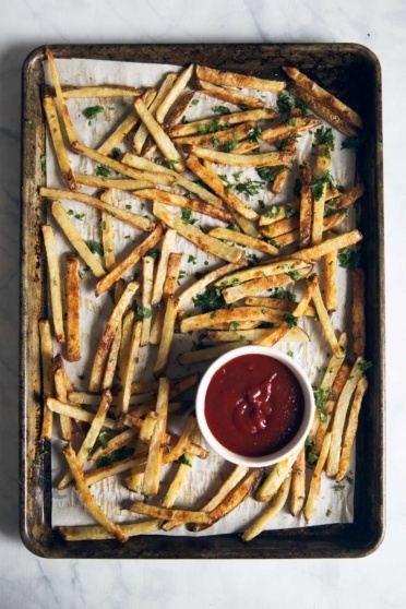 Healthy Baked Crispy French Fries with garlic, parmesan and truffle oil! Taste like your favorite from a restaurant!