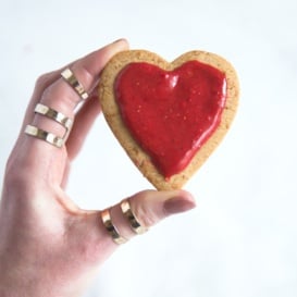 heart-shape whole wheat sugar cookies with strawberry icing