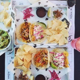 tacos and chips on a table