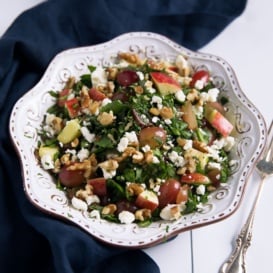 fruit and nut salad with cheese in a bowl