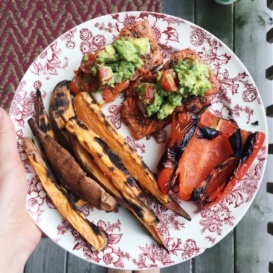 plate with sweet potato fries, salmon, and grilled pepper