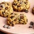 zucchini breakfast cookie on a plate with a bite taken out