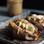 baked sweet potatoes on a baking sheet