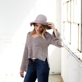 monique posing with a hat on