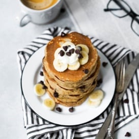 Beautiful whole grain banana bread pancakes that are perfectly sweet and fluffy. Made with whole wheat flour and dairy free too!