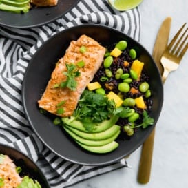 chili lime salmon bowl with forbidden rice, mango and edamame