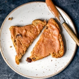 Slow cooker apple butter on a piece of toast
