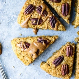 vegan pumpkin oatmeal scones topped with pecans