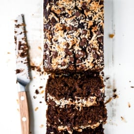 double chocolate pumpkin bread sliced next to a knife