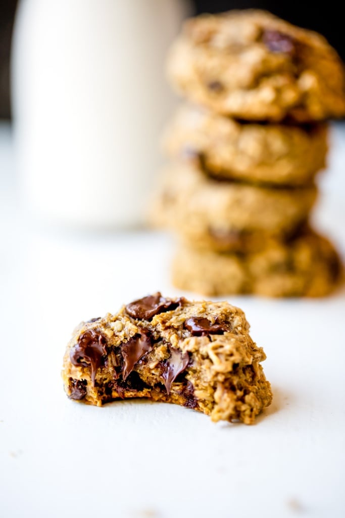 Whole grain pumpkin oatmeal chocolate chip cookies packed with cozy pumpkin flavor + plenty of chocolate chips. Made with coconut oil instead of butter!