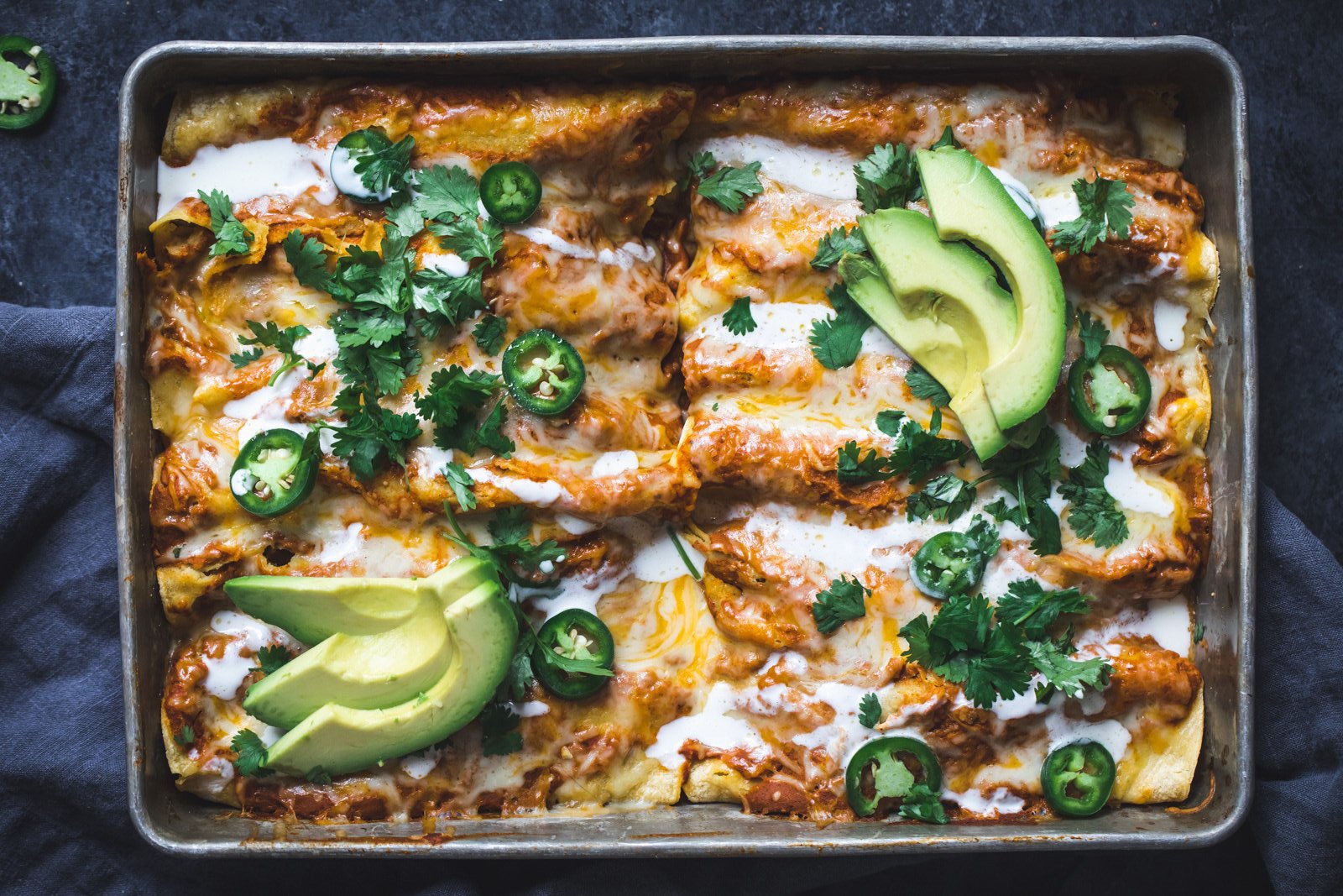 pumpkin enchiladas in a pan