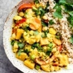 pumpkin curry with brown rice on a plate