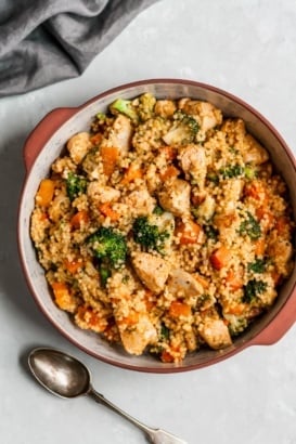 broccoli cheddar chicken couscous in a ceramic pot