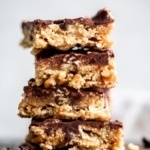 chocolate caramel tahini chex bars in a stack