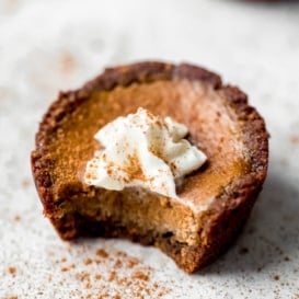 mini pumpkin pie with a bite taken out