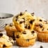two chocolate chip yogurt muffins in a stack