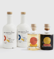 two bottles of olive oil and two bottles of vinegar