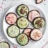 mint chocolate cookies with mint frosting on a plate