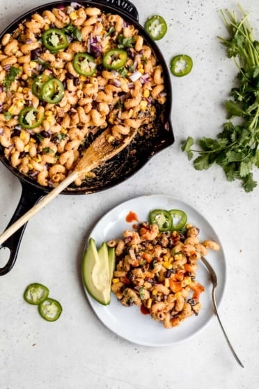 vegan taco pasta on a plate and in a skillet