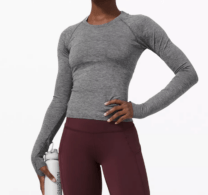 woman with a grey longsleeve shirt on