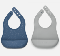 a grey and a blue silicone bib next to each other